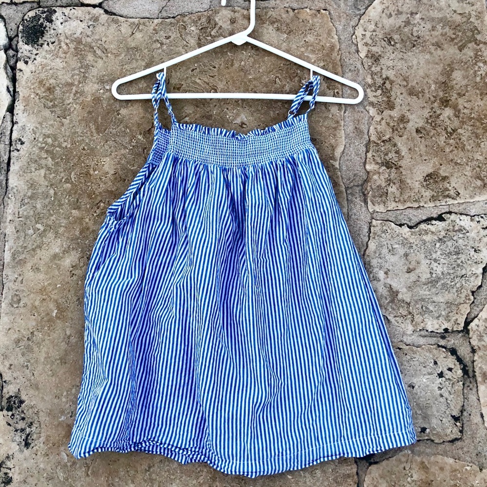 Spaghetti strap loose tank top.